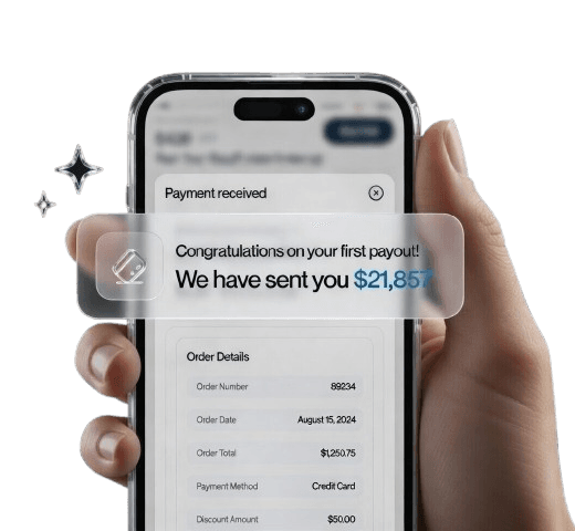 Smartphone showing congratulations on first payout notification: We have sent you $21,857